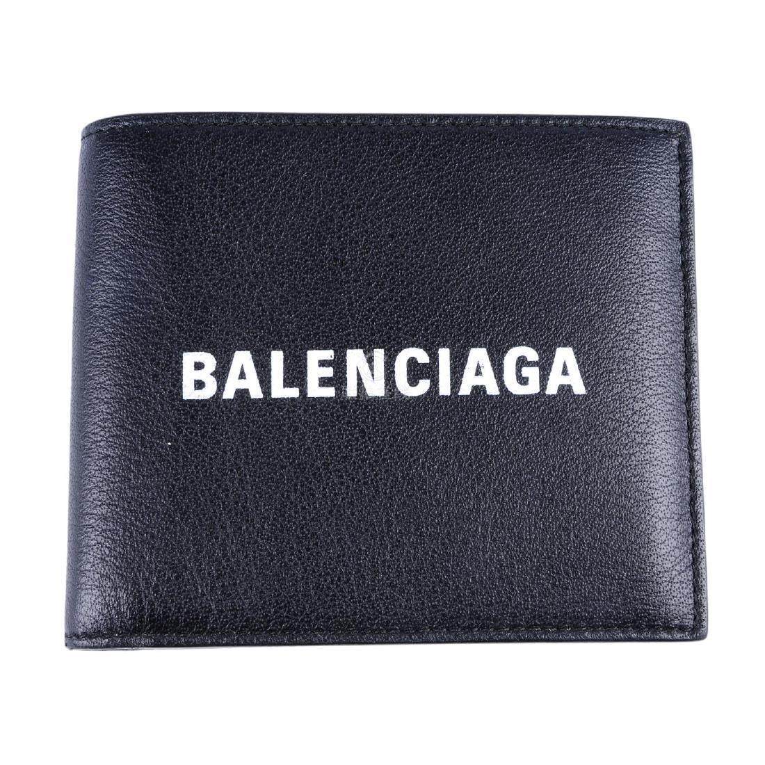 balenciaga - a billfold logo wallet. designed with a