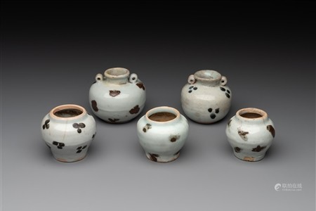 Five Chinese russet-splashed Longquan celadon jarlets, Song/Yuan