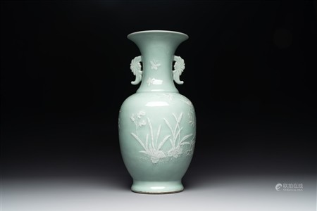 A Chinese slip-decorated celadon-glazed vase with floral design, Qianlong mark and of the period