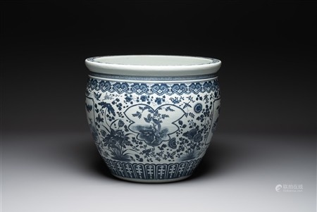 A large Chinese blue and white fish bowl with birds, deer, insects and flowering branches, 19th C.