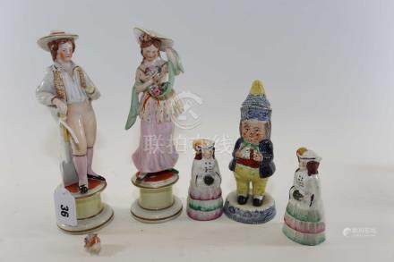  A PAIR OF 19TH CENTURY STAFFORDSHIRE FIGURES OF A GARDENER AND HIS COMPANION