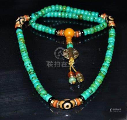 Turquoise buddha prayer bead