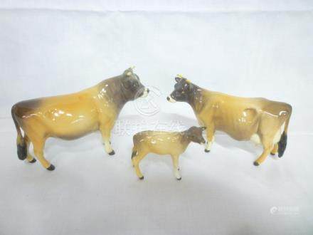  A Beswick china Jersey bull, cow and cal