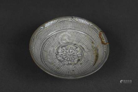 A buncheong bowl with stamped design