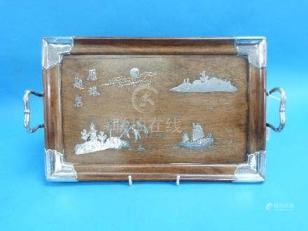  An early 20thC Chinese silver mounted hardwood Tray, of rectangular form with two silver handles,