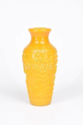  A Chinese yellow Peking glass vase Of slender ovoid form, with folded swept upper rim, the body