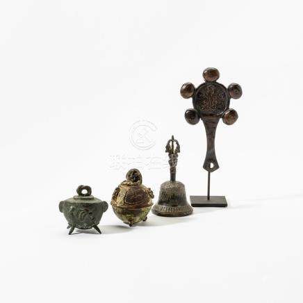 A collection of two bronze Chinese bells, a Chinese rattle a