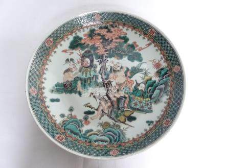 CHINE
						
						
						Plat en porcelaine à décor de sage, fin XIX ème, diam 36 cm