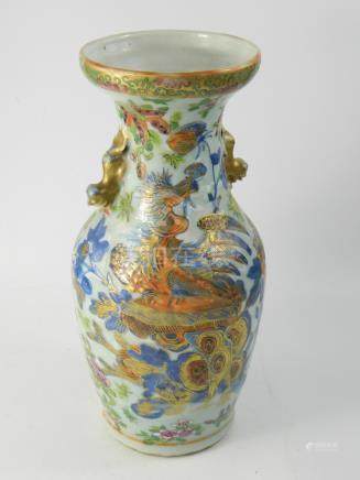  Chinese Famille Verte twin handled baluster vase having all over hand painted bird and floral