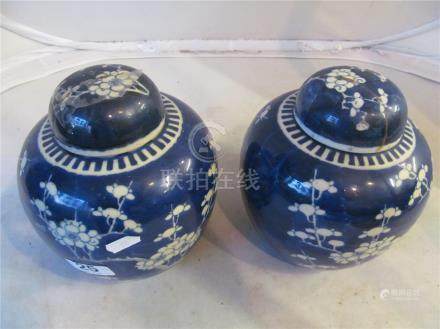  A pair of oriental ginger jars prunus blossom and other modern oriental blue and white china.