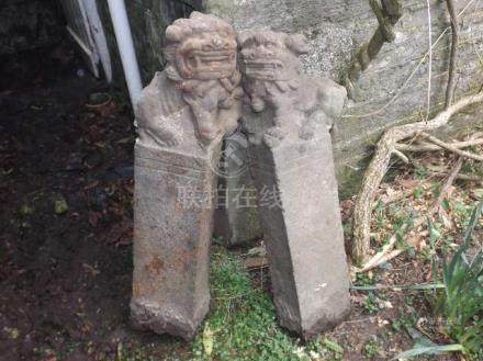  A pair of c.1500 Chinese carved stone temple foo d