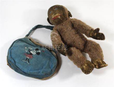  A vintage Merrythought plush Monkey, with original label to foot, length 19cm, together with a