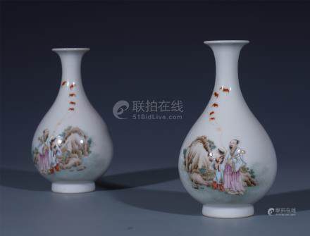 PAIR OF CHINESE PORCELAIN FAMILLE ROSE FIGURES VASES