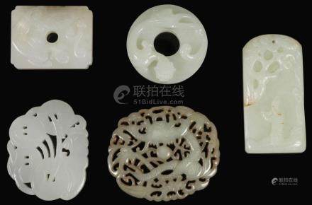 FIVE CHINESE CARVED JADE PENDANTS, QING