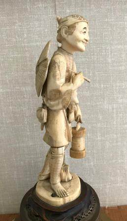 
      Antique Japanese Carded Fisher Woman Statue
  