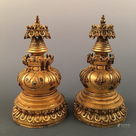 A Pair of Chinese Bronze Candle Holder