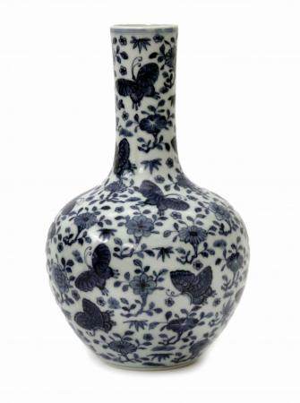 
      A Narrow Necked Vase with Decoration of Butterflies and Flow
  