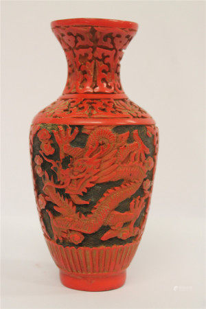 A Chinese cinnabar lacquer style baluster vase, 16.5cm.