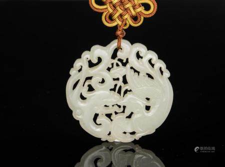 Qing - A White Jade Carved ‘Dragon And Phoenix’ Pendant