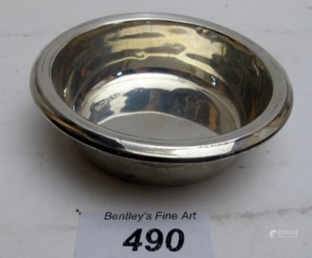 A silver dish designed by Gerald Berry,