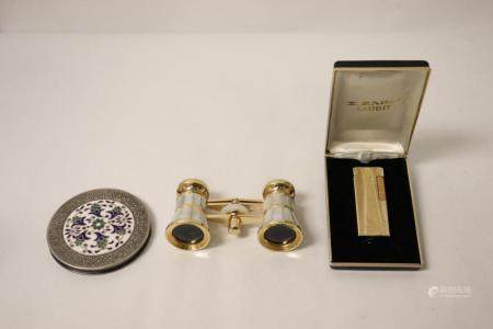 3 pieces; a lighter, an enamel compact and an opera binocula