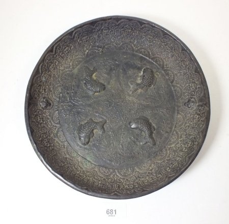 A bronze Chinese dish cast fish, 25cm diameter