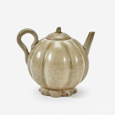 A Chinese celadon-glazed melon-form small ewer and cover, Song Dynasty