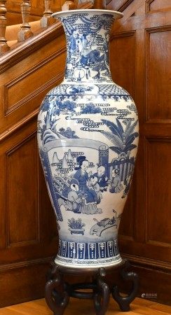 A LARGE CHINESE PORCELAIN BLUE AND WHITE VASE OF KANG HSI DESIGN with many figures and emblems, on a