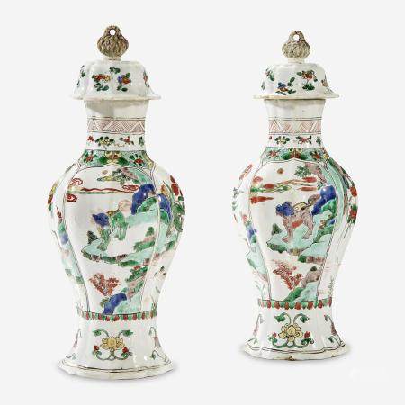 A Pair of Chinese Famille Verte-Decorated Porcelain Baluster Vases and Covers Kangxi period