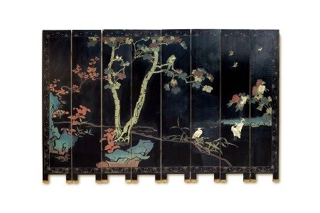 A late 19th century Chinese black and polychrome coromandel lacquer eight-fold screen