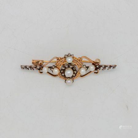 Yellow gold openwork brooch, the central motif punctuated with probably fine pearls and small r