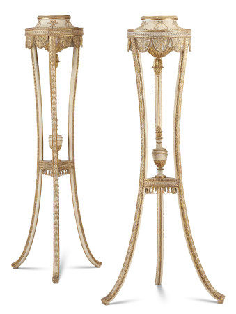 A PAIR OF GEORGE III WHITE-PAINTED AND PARCEL-GILT COMPOSITION TORCHERES SUPPLIED BY JAMES WYATT, CIRCA 1785