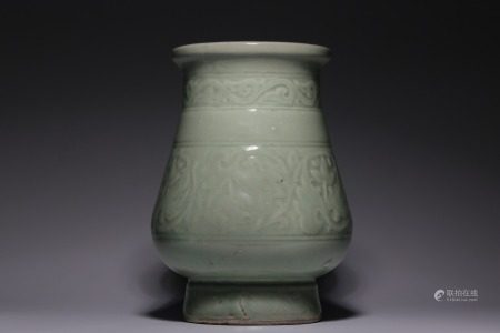 A Chinese Bean green glaze carved sculpture