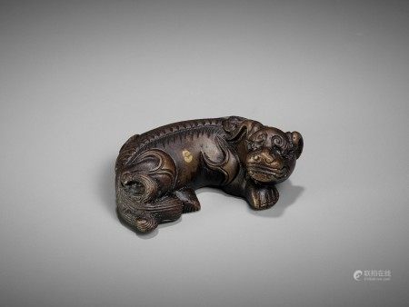 A BRONZE ‘BUDDHIST LION’ WEIGHT, MING DYNASTY