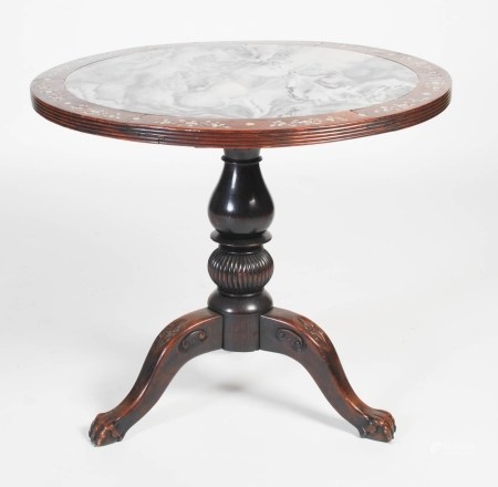 A Chinese darkwood snap-top occasional table, Qing Dynasty, the hinged top with a mottled black,