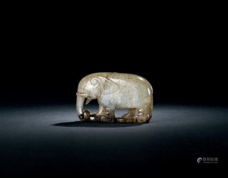 玉雕象  A GREYISH-WHITE AND BROWN JADE CARVING OF AN ELEPHANT