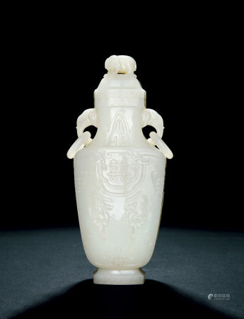 清乾隆 白玉雕螭龍紋雙象耳環耳蓋瓶 QIANLONG PERIOD, 1736-1795 A RARE CARVED WHITE JADE 'CHI-LONG' ELEPHANT-HANDLED VASE AND COVER