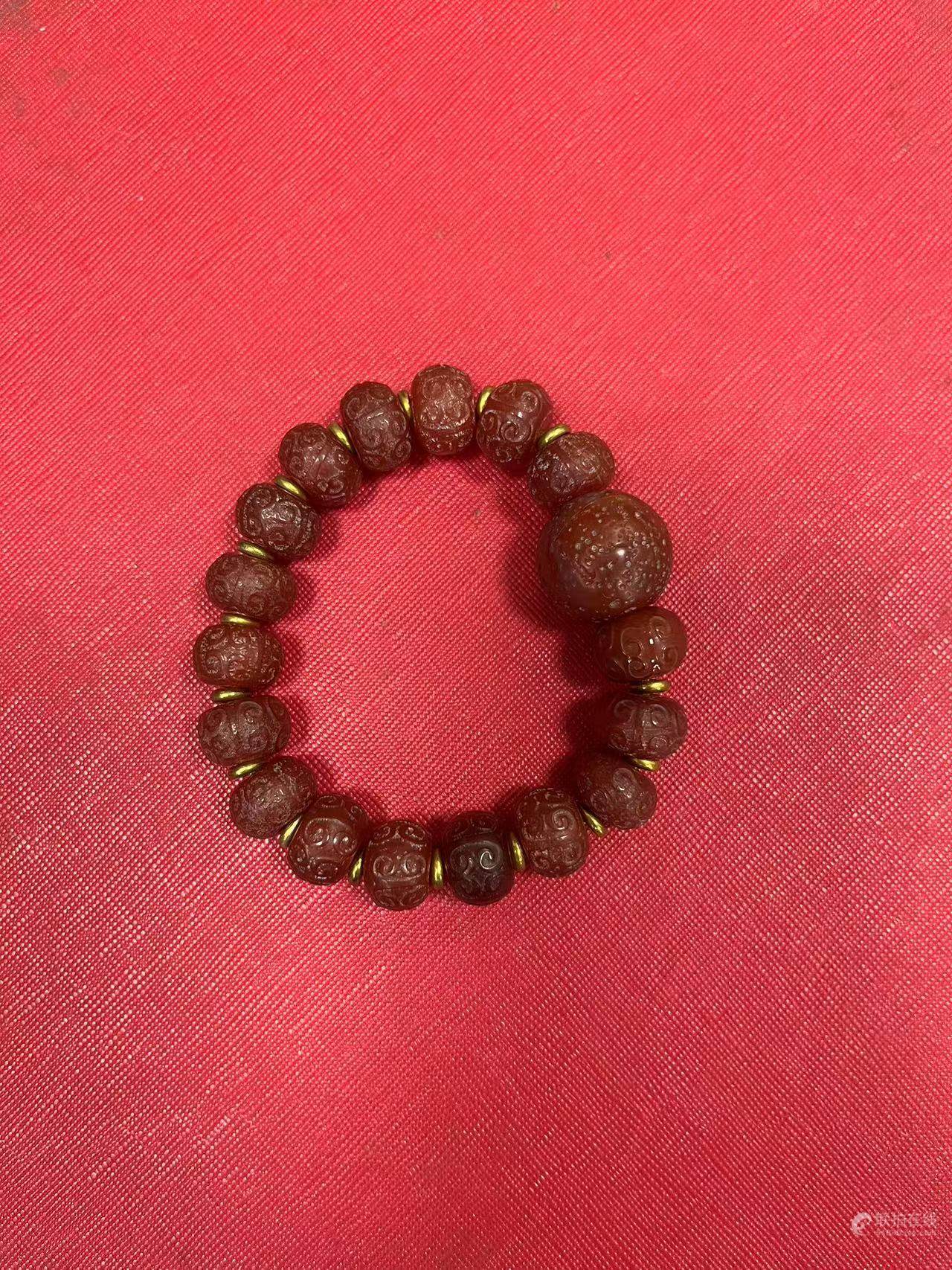 旧藏西周玛瑙珠手串。桶珠小17粒。大粒珠1粒。